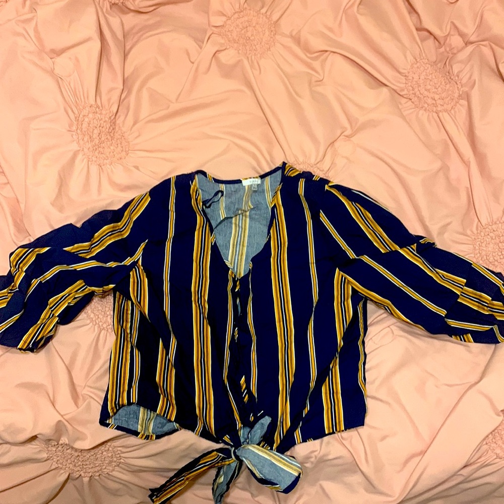 This blouse is unworn and clean.